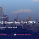 New York City skyline with event details for NAB Show New York 2024 at Javits Center on 9-10 October.